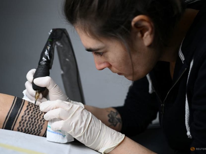 Palestinian keffiyeh scarves - a controversial symbol of solidarity