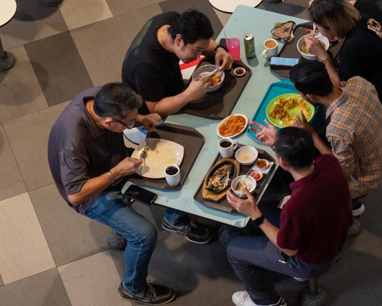 20 food stall licensees caught flouting mask, spit guard requirements: SFA