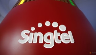 Singtel's annual underlying profit rises 9% to S$2.47b, announces share buyback