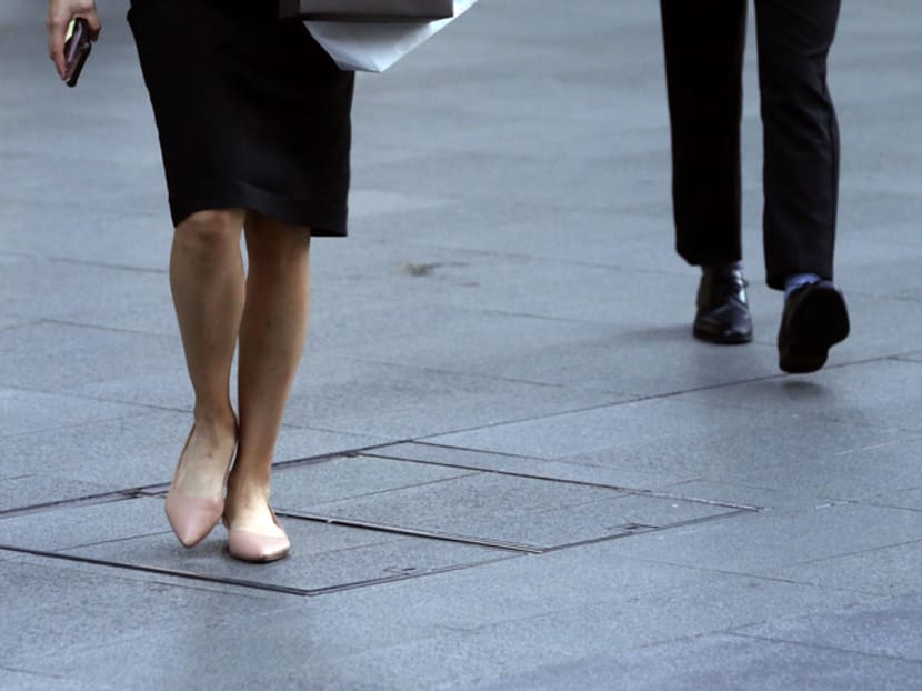 More women than men in a survey by the Singapore Chinese Chamber of Commerce and Industry said that they had experienced gender discrimination in the workplace.