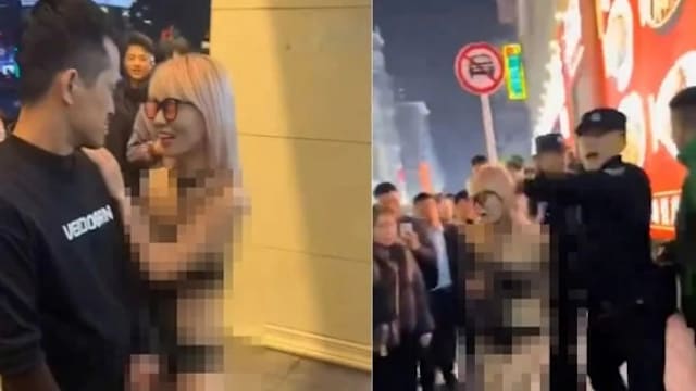 中国性感女当街与男子发生不雅行为 民众未制止反围观起哄