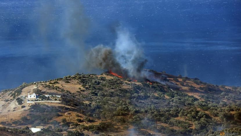 Firefighters battle wildfire on Crete as thousands evacuated