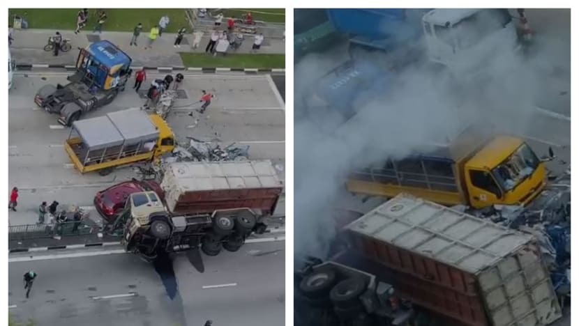 Driver hospitalised after lorry crashes through road barrier at junction of Pioneer Road and Jurong West Ave 5 