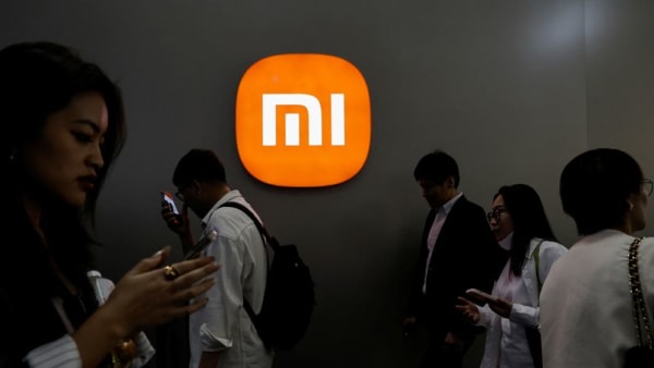 Xiaomi to invest at least $6.9 billion in chip design, founder says - Channel News Asia (Picture 2)