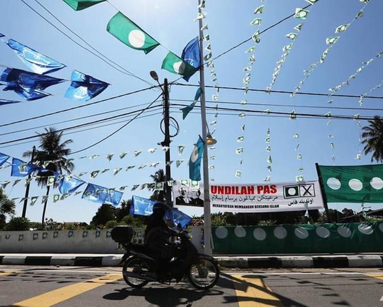 Commentary: A potent political force faces huge challenges as UMNO, PAS join hands