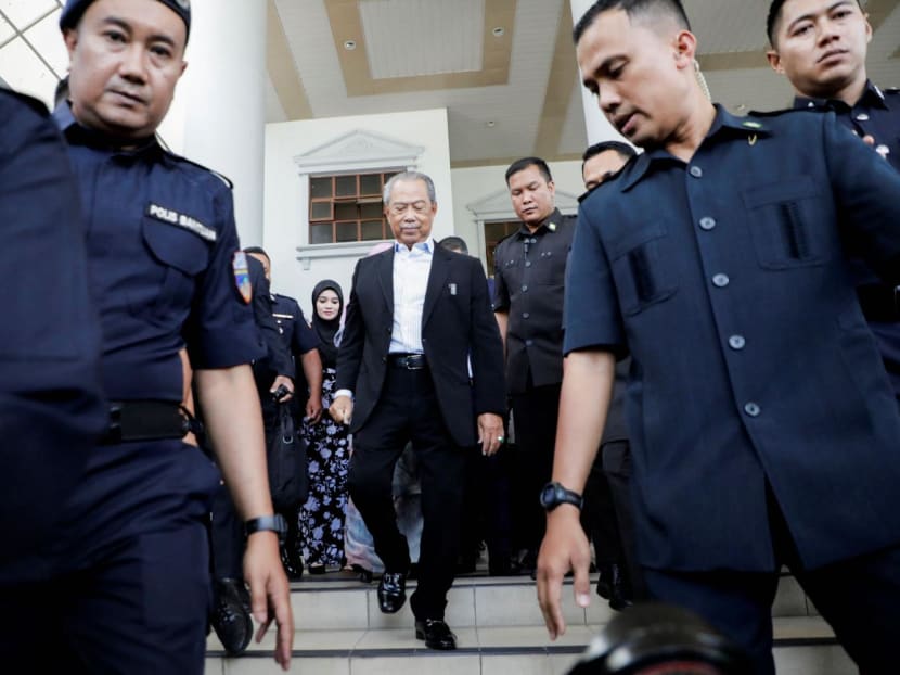 Former Malaysian Prime Minister Muhyiddin Yassin (centre) walking outside Kuala Lumpur Court Complex in Kuala Lumpur, Malaysia on March 10, 2023. Former Malaysian Prime Minister Muhyiddin Yassin (centre) walking outside Kuala Lumpur Court Complex in Kuala Lumpur, Malaysia on March 10, 2023.