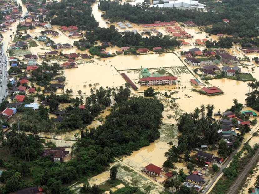 A file picture showing an aerial view of Pasir Mas in Kelantan inundated by flood water on Dec 29, 2014.