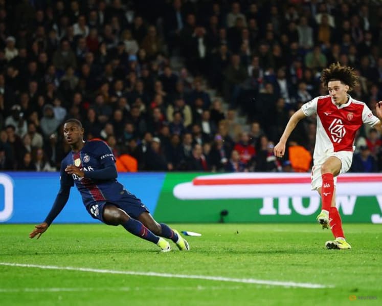 PSG see off late Monaco surge to advance in Champions League