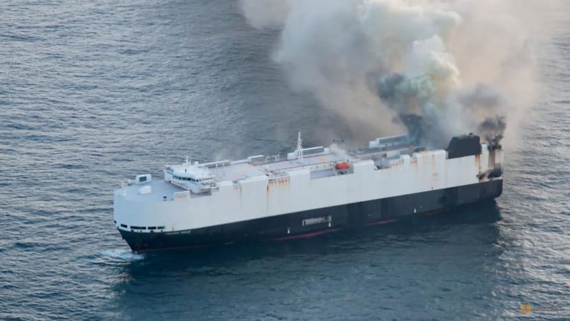 Burning cargo ship carrying 3,000 vehicles abandoned off Alaska Burning cargo ship carrying 3,000 vehicles abandoned off Alaska