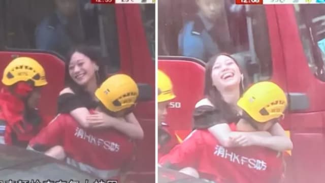 黑色暴雨让她因祸得“福” 港女熊抱消防员笑开怀成焦点