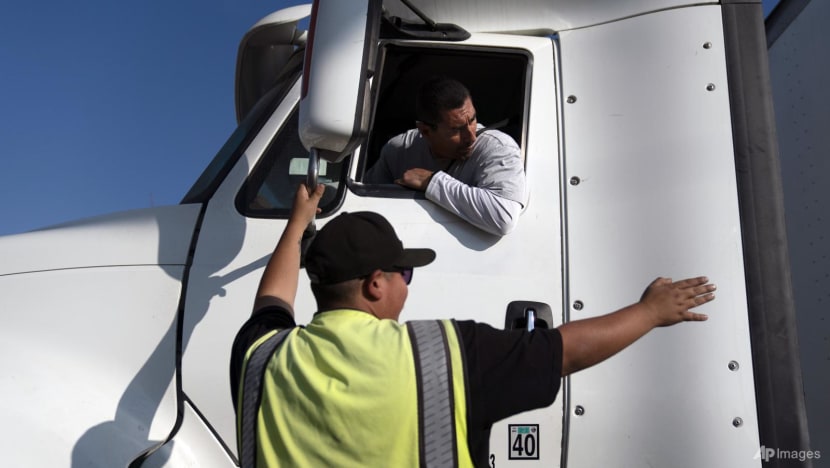 US threatens to withhold funding from states over truck driver English proficiency rules