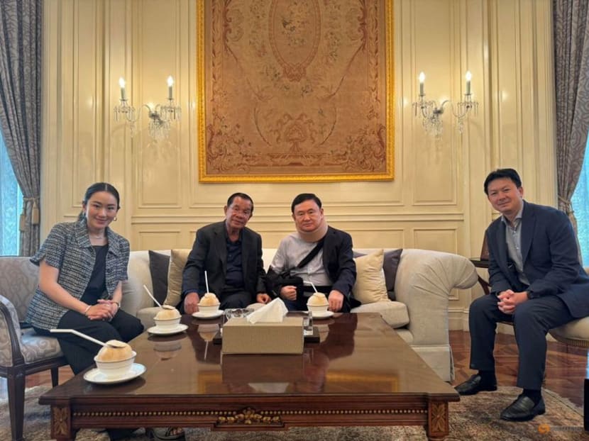 Cambodia's former Prime Minister Hun Sen poses for a picture during his meeting with Thailand's former Prime Minister Thaksin Shinawatra, in a location given as Bangkok, Thailand, in this handout image released on Feb 21, 2024.
