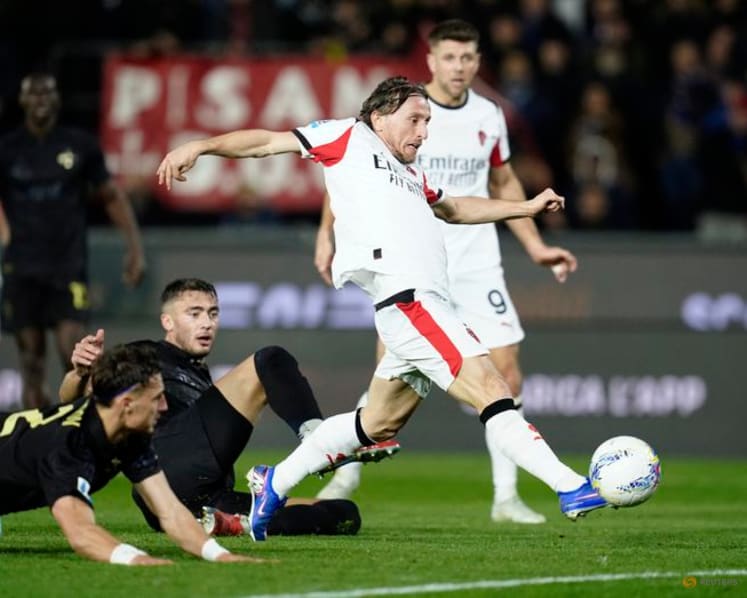 Modric nets late winner as Milan survive scare at Pisa