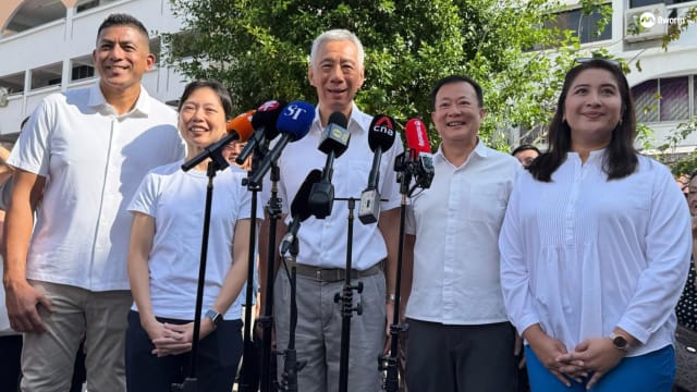 卫生部前副常秘刘洁敏与赖添发 现身行动党宏茂桥集选区活动