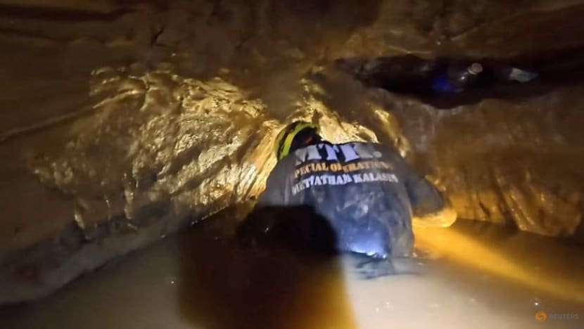 'It’s like diving into coffee': Rescuers in Laos describe risky mission to free men trapped in cave