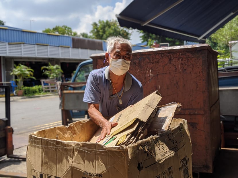 A rag-and-bone man sorting out his cardboard at Ang Mo Kio Industrial Park 2 on July 30, 2020.