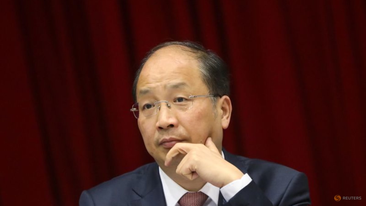 Former head of China securities watchdog Yi Huiman under corruption probe