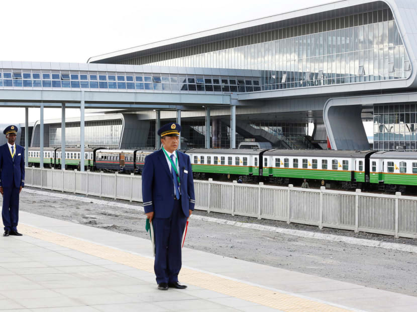 Kenya Railways attendants at the Nairobi Terminus in Kenya’s capital, Nairobi, preparing to receive a train last month on a railway line built by the China Road and Bridge Corporation and financed by the Chinese government. A US economist calls China’s enthusiasm for the continent ‘the most important single development for Africa in this generation’. Photo: Reuters