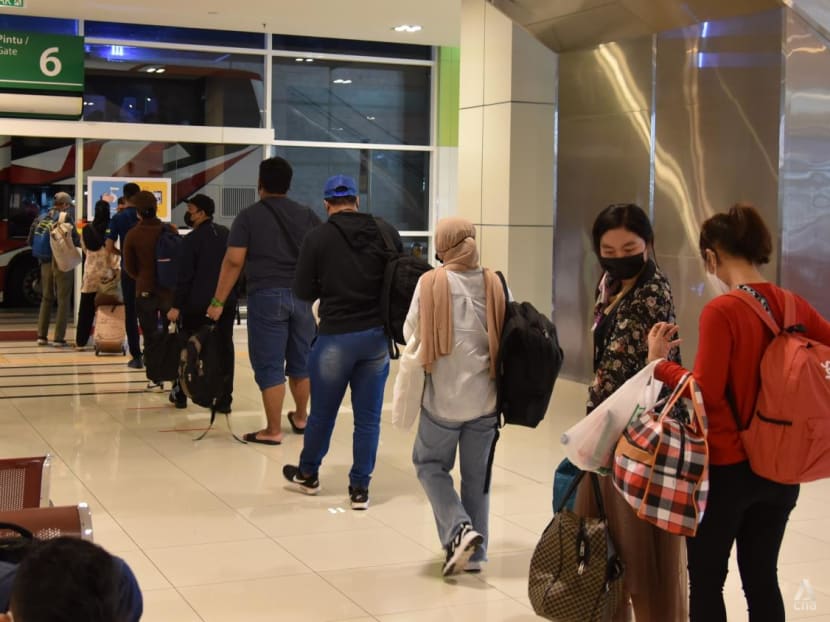 'Even if it's for just one day': Some Malaysians return home to meet family on first day of interstate travel