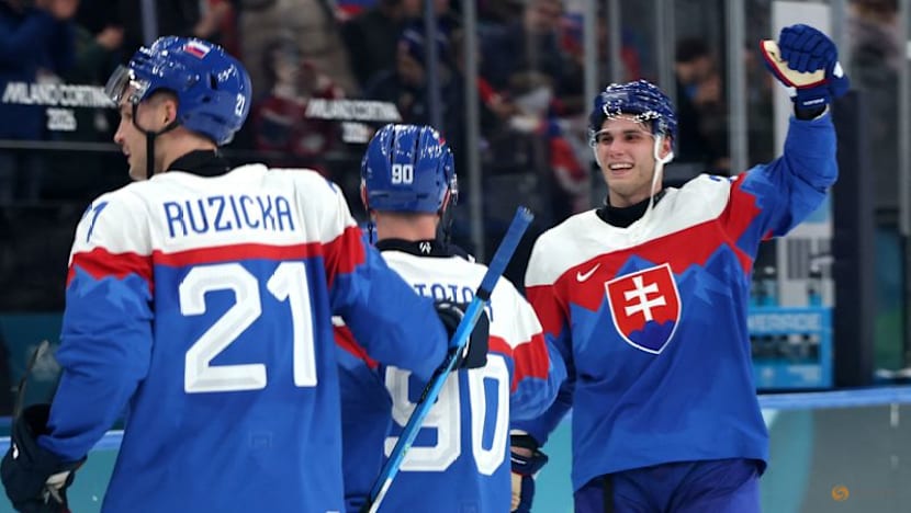 Ice hockey-Sweden overcome surprise Italy fight, Slovakia stun defending champs Finland
