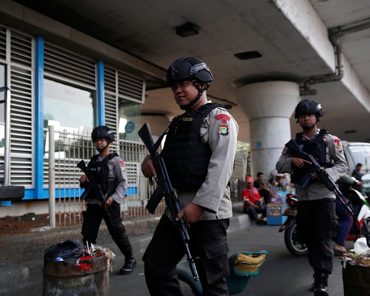 Singaporeans in Jakarta, shaken by attack, stay indoors