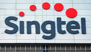 Singtel's first-half underlying profit rises 14%