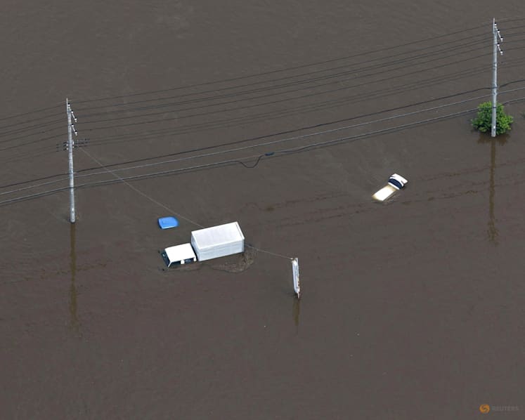Record rain in Japan kills four, leaves thousands stranded at Narita airport