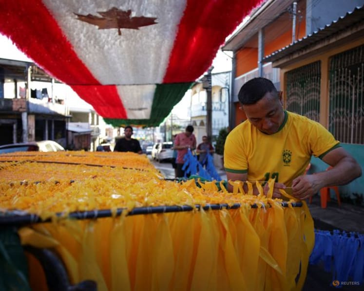 In Rio, artisan crafts World Cup trophies while hoping Brazil gets a real one