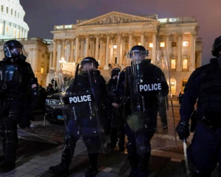 US Congress reconvenes to certify Biden win after protesters invaded Capitol