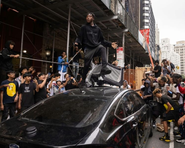 Social media influencer Kai Cenat faces charges of inciting riot after thousands cause mayhem in New York