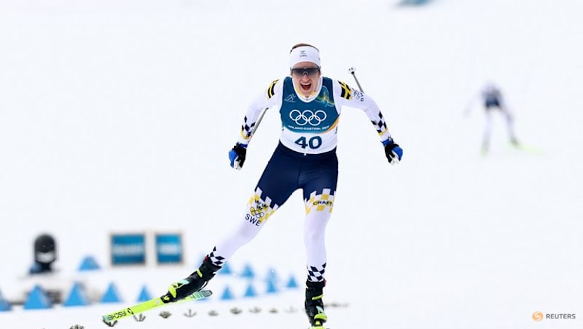 Crosscountry-Broken skis, shirtless racers as erratic weather causes havoc