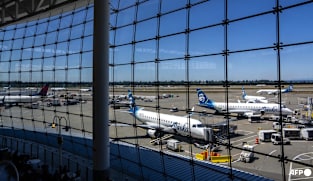 China tells travellers to use caution after 'malicious' US border checks