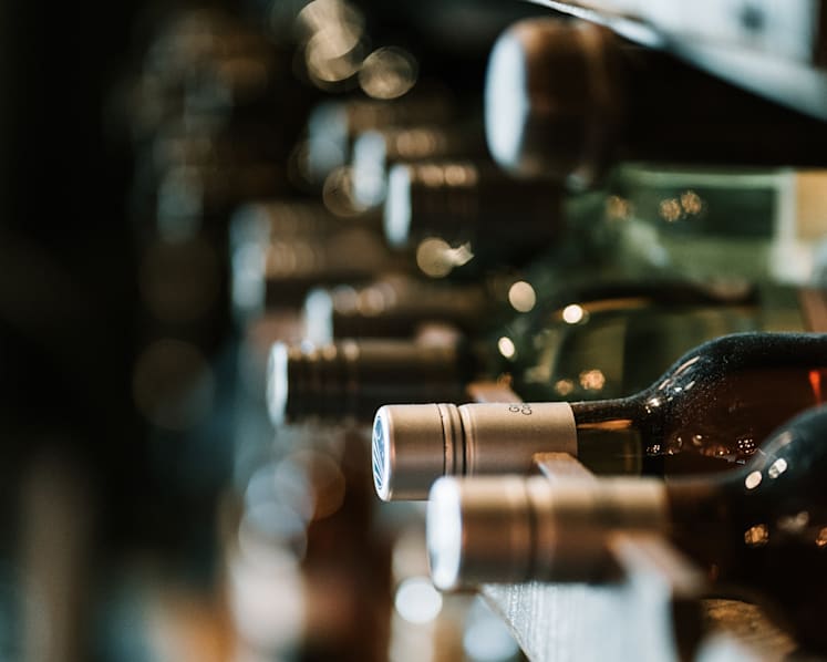 Man suspected of breaking into houses and stealing wine arrested