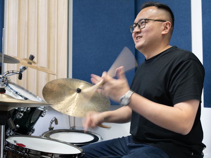 He wasn't 'smart enough' for studies. Now, he owns five drum schools and holds a Guinness World Record