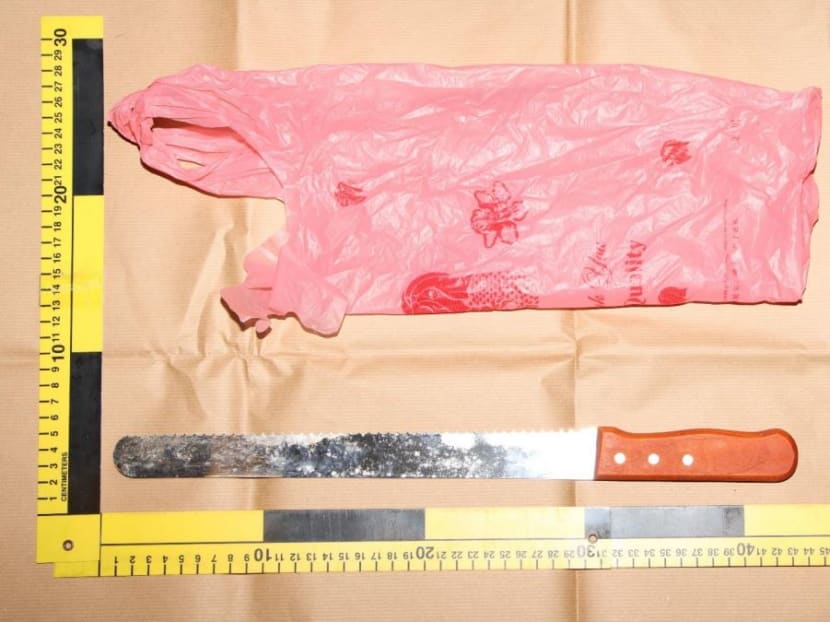 A photo of the bread knife used during the riot and the plastic bag in which the knife was found in.