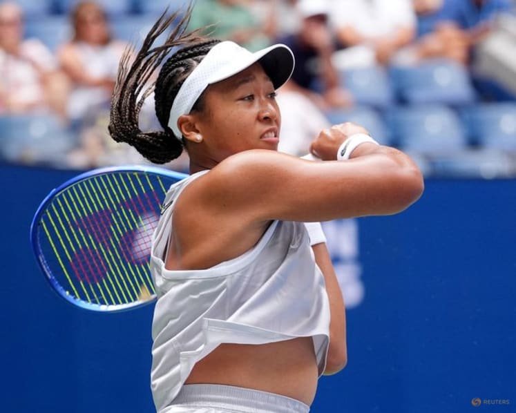 Osaka holds her nerve to reach US Open third round