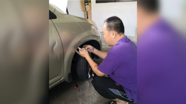 爱犬连续五天对车狂吠  屋主一查发现引擎藏蛇