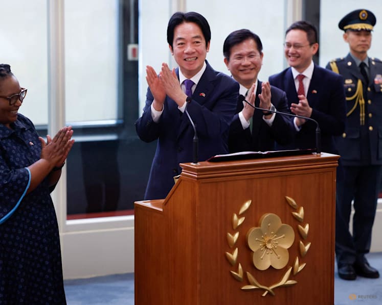 Taiwan won't give in to pressure, president says on return from Eswatini