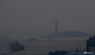 Massive wildfires in US West bring haze to East Coast