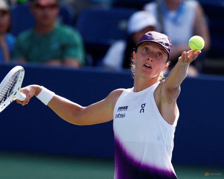 Swiatek happy to swap noisy Ashe spotlight for intimate Grandstand