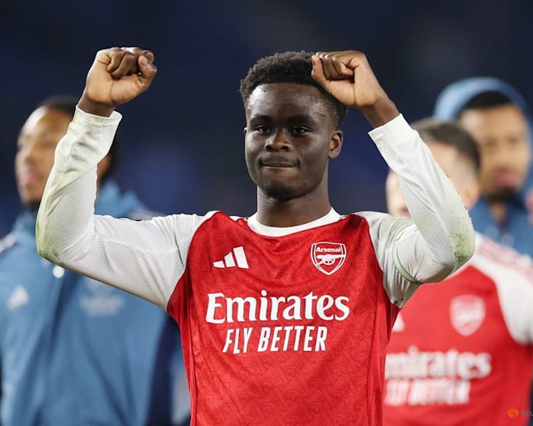 Double joy for Arsenal as Saka winner at Brighton sends them seven points clear