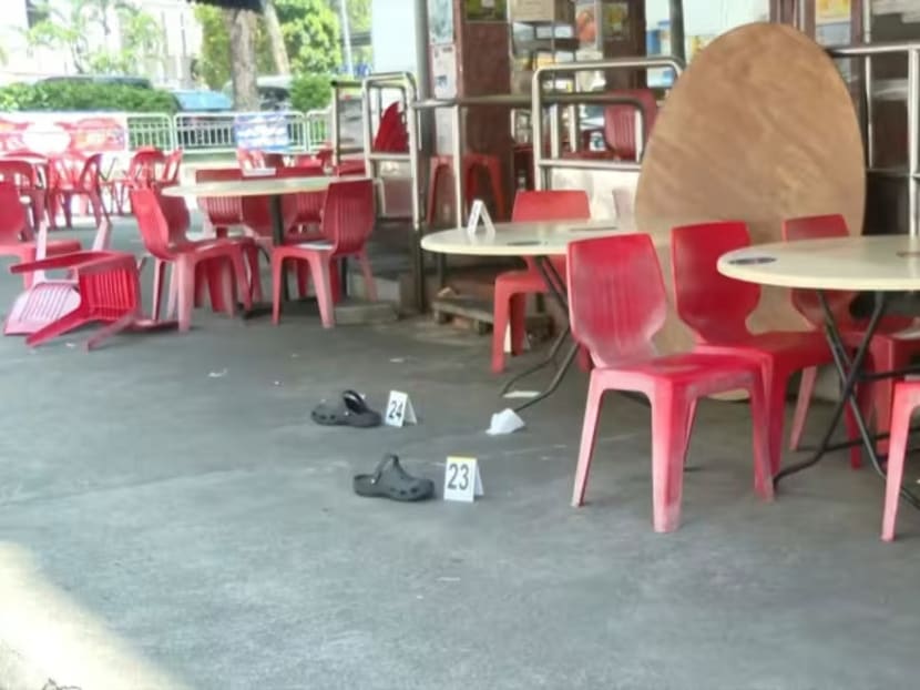 A pair of slippers marked as evidence at a coffee shop at Verdun Road on Sept 22, 2024. A pair of slippers marked as evidence at a coffee shop at Verdun Road on Sept 22, 2024.