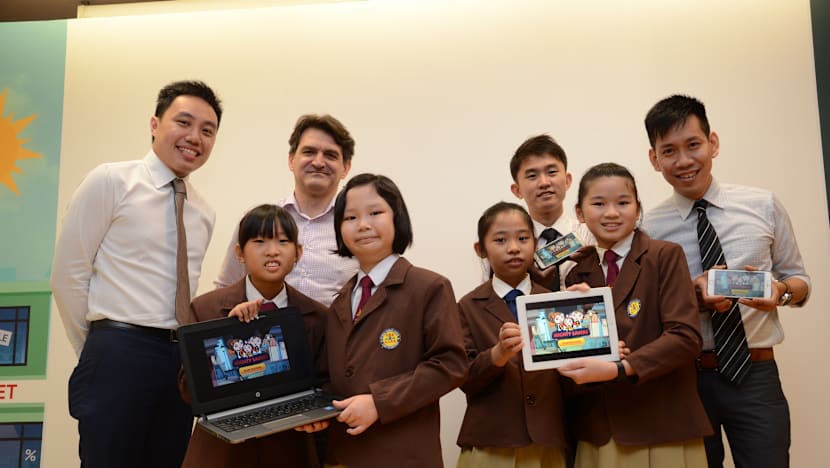 Four Yu Neng Primary School students co-create money management gaming app with OCBC
