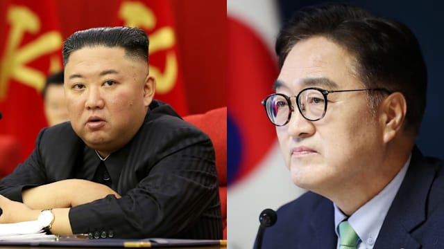 金正恩在北京同韩国国会议长握手致意