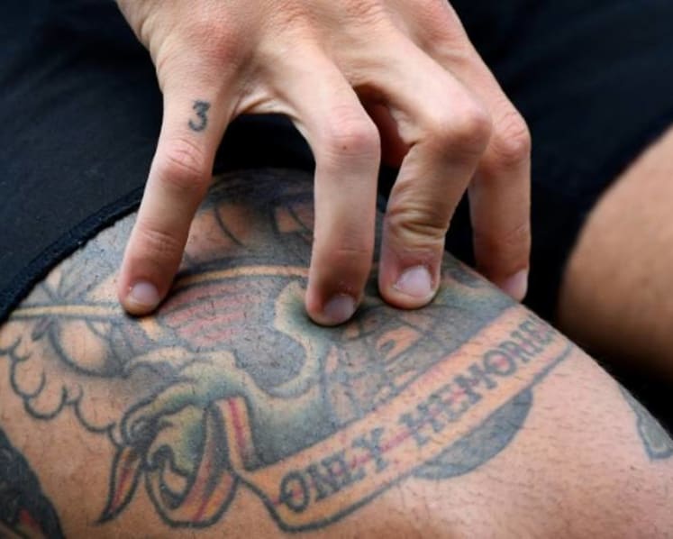 Commentary: Why millennials are uncovering tattoos at work