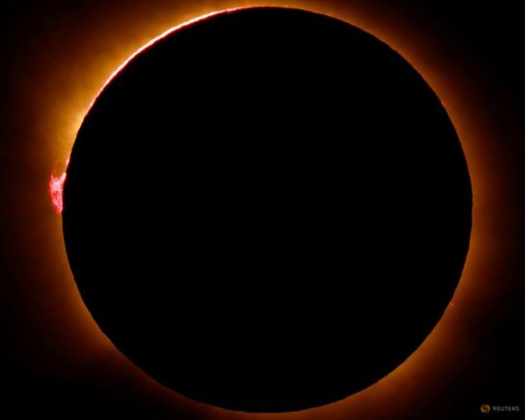 Spain darkens as solar eclipse races south from Arctic
