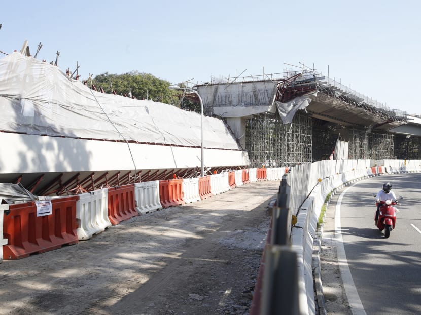 The collapsed viaduct at Tampines, near the Pan-Island Expressway exit to Tampines Expressway, taken on 17 July 2017. In his first public comments on last week’s collapse of a partially completed viaduct, Manpower Minister Lim Swee Say said yesterday that there were “lessons to be learnt”. Photo: Najeer Yusof