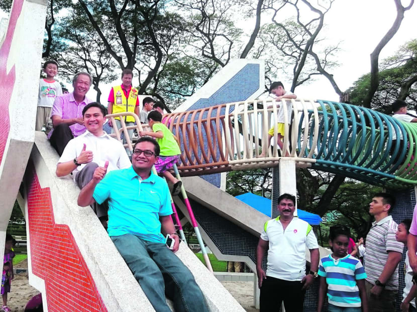 (From top) Mr Ng Eng Hen, Toa Payoh East Citizens’ Consultative Committee vice-chair Saktiandi Supaat and Mr Zainudin Nordin on the Red Dragon slide. Photo: Lee Yen Nee