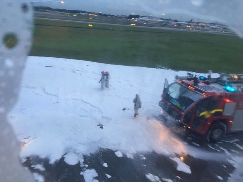 SIA jet makes emergency return to Changi, bursts into flames on runway