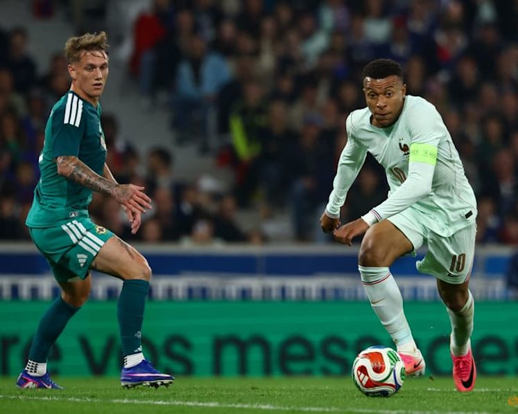 Olise stakes World Cup claim with hat-trick in France win